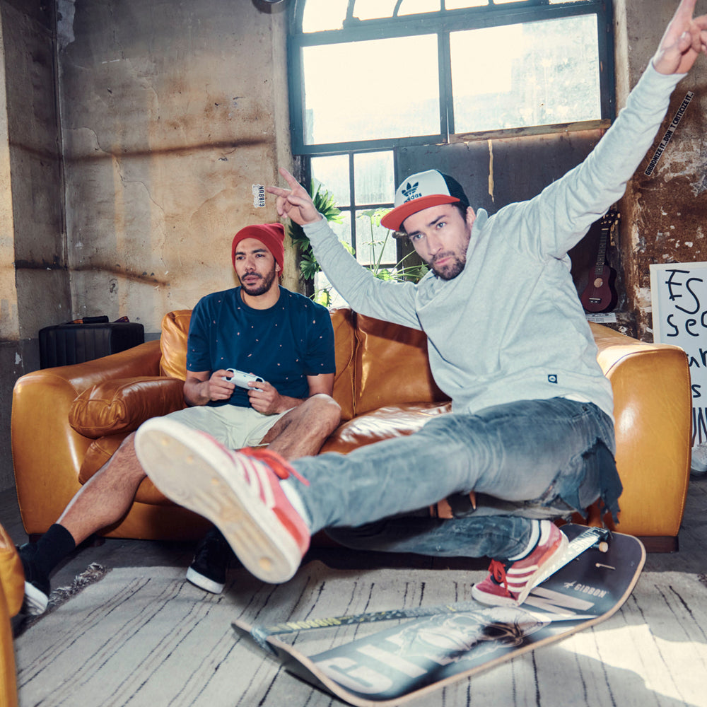 Freestyle trick on the classic GIBBON SlackBoard, a minimalist maple wood balance board