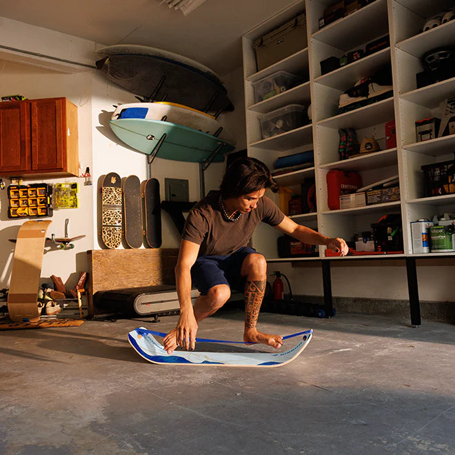 Athlete performing advanced stability and mobility exercises on Gibbon SlackBoard Mountain