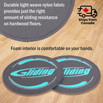 Gray gliding Disc on a wooden floor, with durable nylon weave fabric and foam interior for hand comfort.