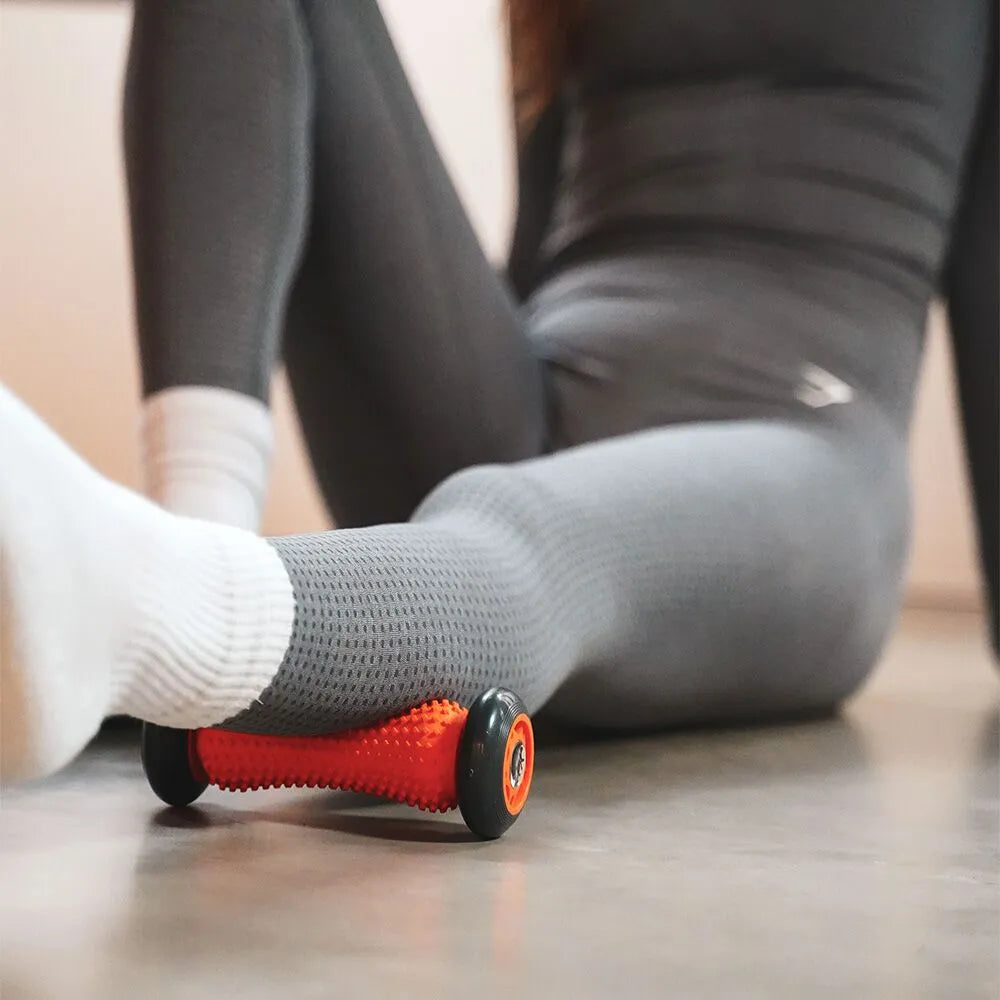 at home calf massage with Tiger Footsie, rolling calf massage, Tiger Footsie massager in Canada