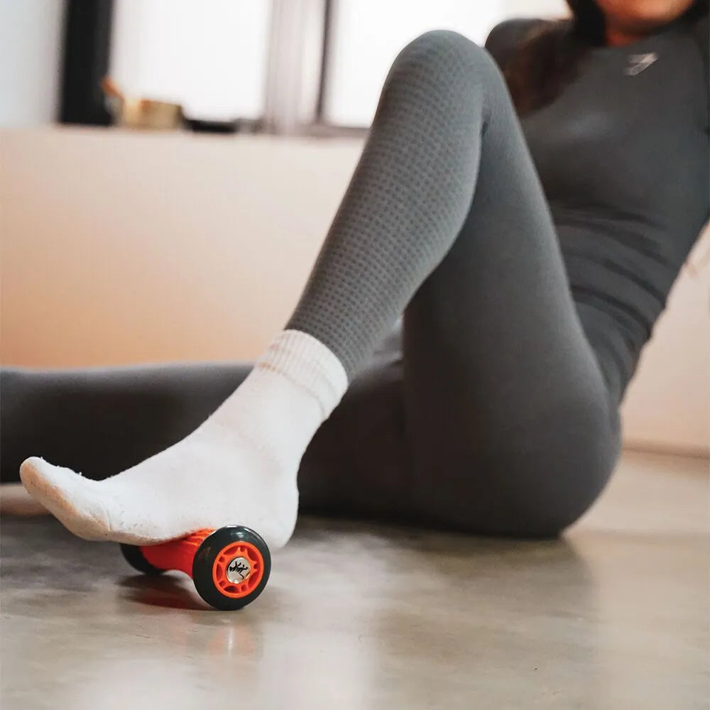 Tiger Footsie massager for foot arch, foot massage at home, rolling foot massager