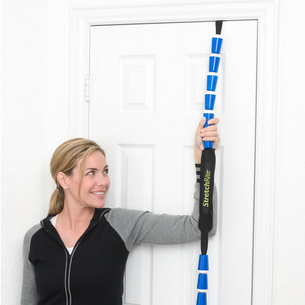 Effective rotator cuff stretch using StretchRite and a door, hand grips make stretching with a strap easier and more accessible 